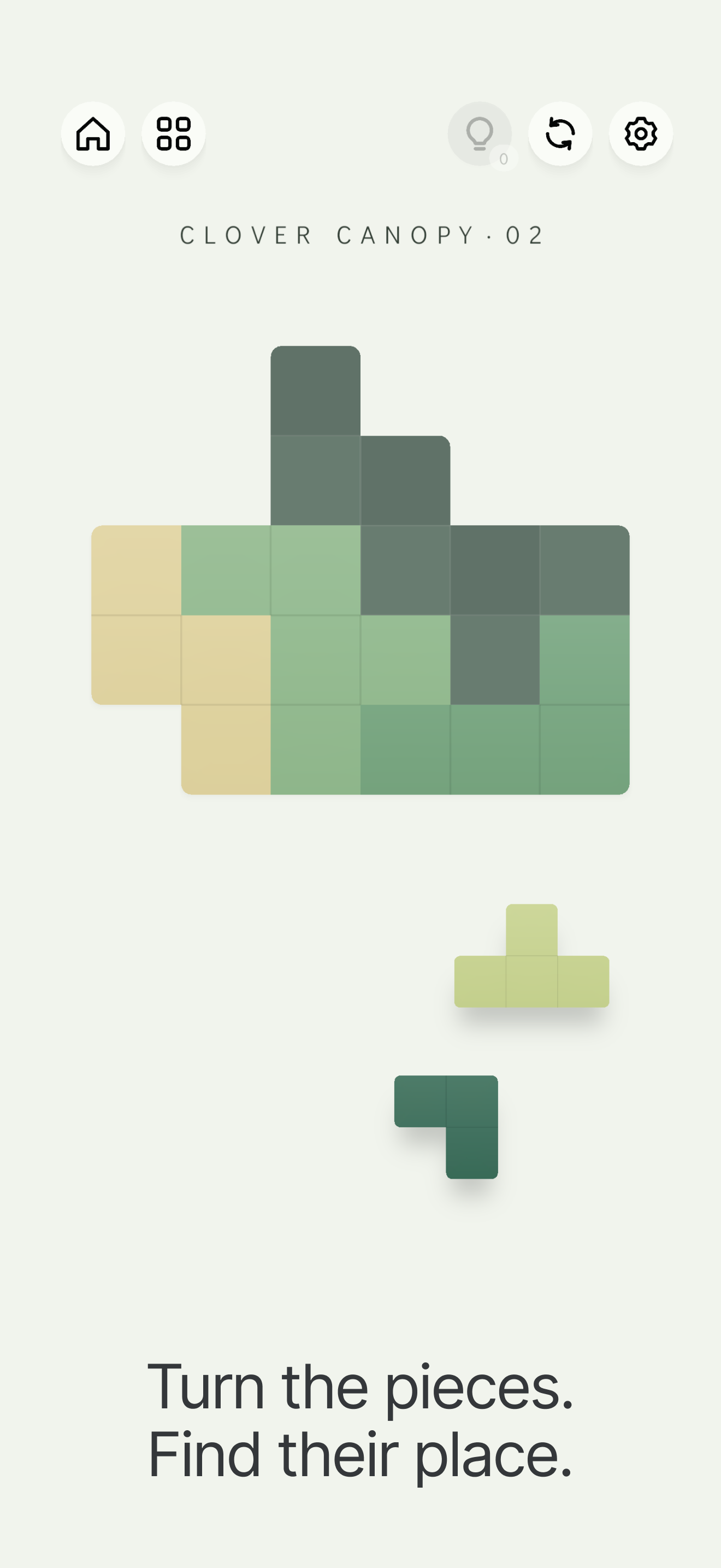 A green Oddly Fit puzzle with pieces in different orientations